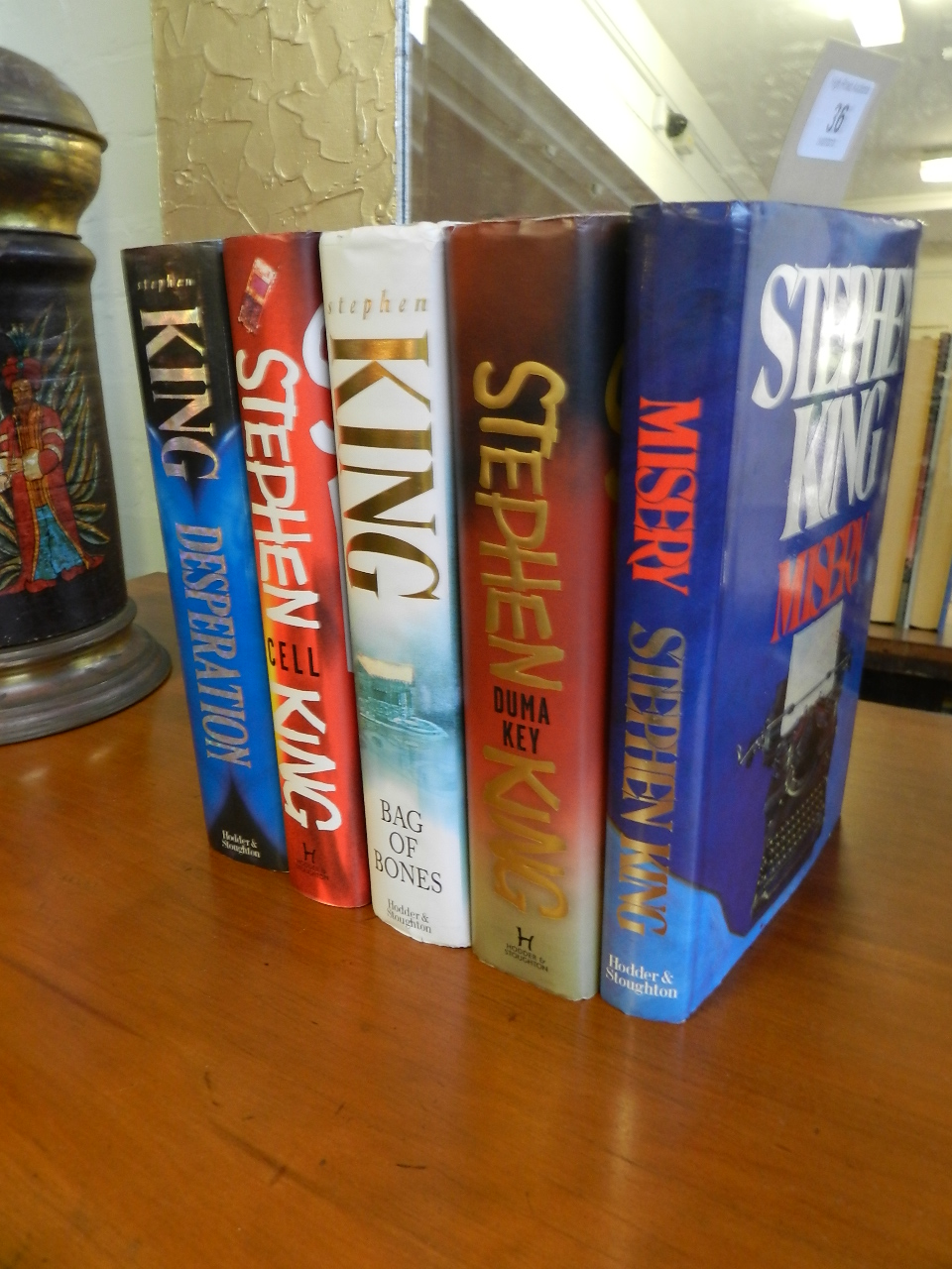 Five first editions of Stephen King novels , hardbacks with dust covers
