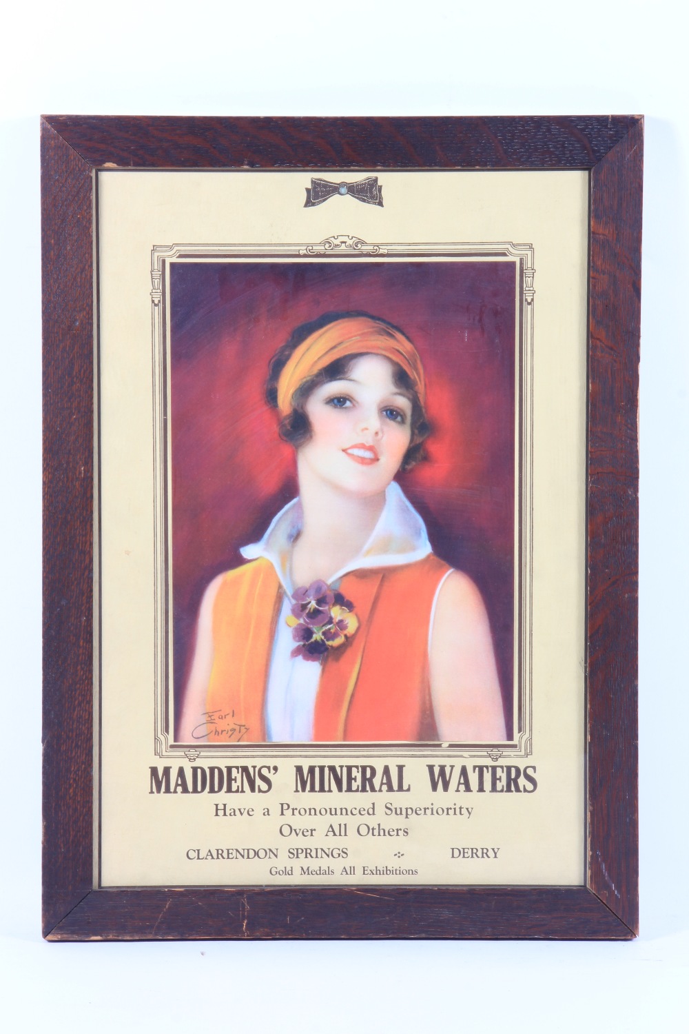 A Madden`s Mineral Water poster designed by Earl Christy showing a fresh faced young woman, 52 x