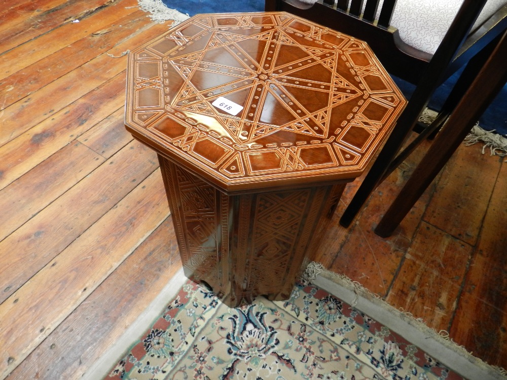 A Persian carved octagonal occasional table.