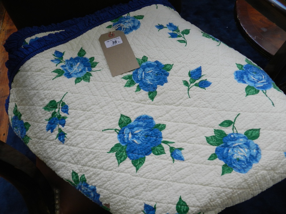 Two hand sewn vintage quilts.