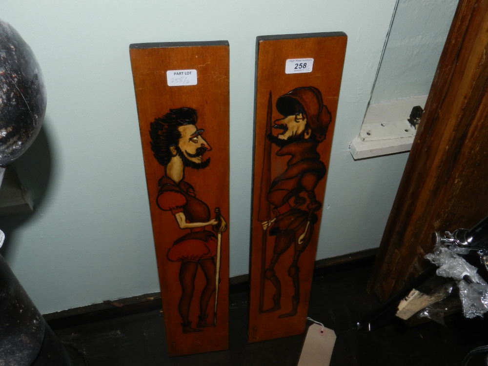 A pair of unusual wooden plaques,impressed TC each depicting a contrasting image of a knight or