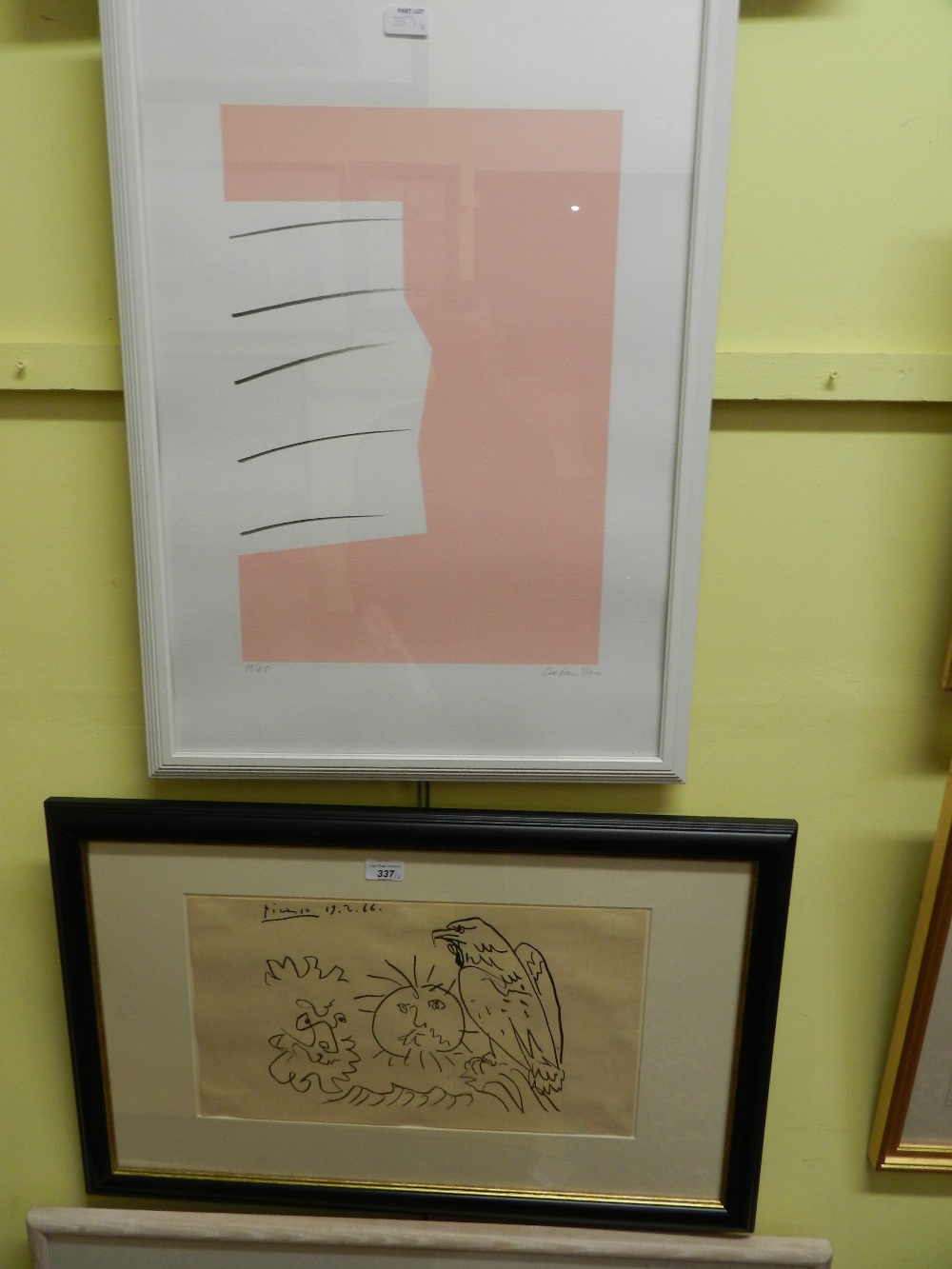 A mounted and framed lithographic Picasso print dated 1960, together with a pink print signed