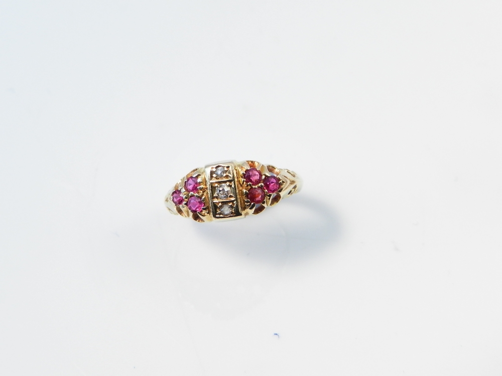A Victorian 18ct gold, ruby and diamond ring.