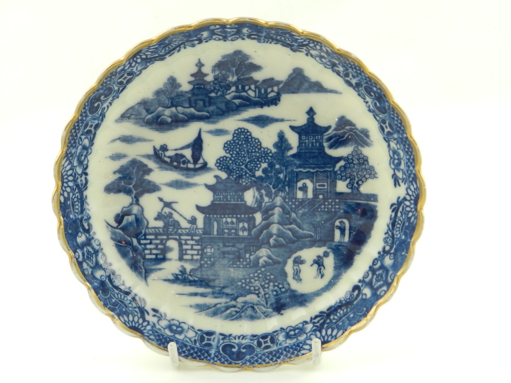 A late 18th century Caughley blue and white porcelain dish decorated in the Eastern style