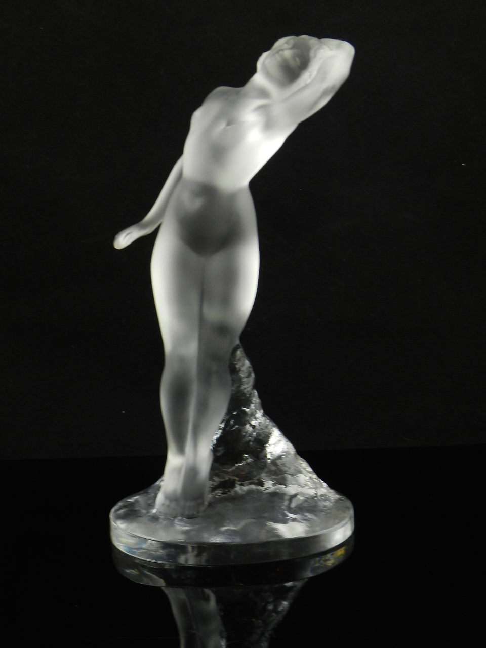 A mid 20th century Lalique frosted glass figurine of a naked lady signed Lalique France