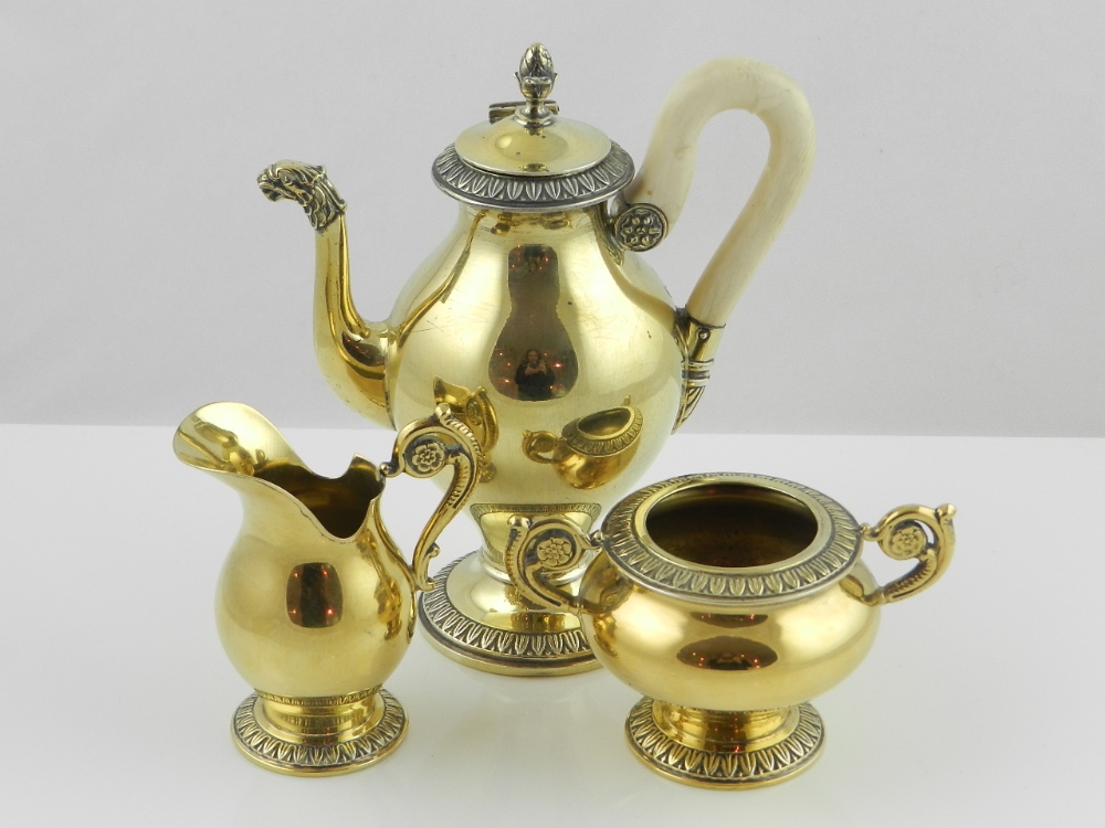 A continental gilt sterling silver bachelors coffee set, in the empire style. 486gs.