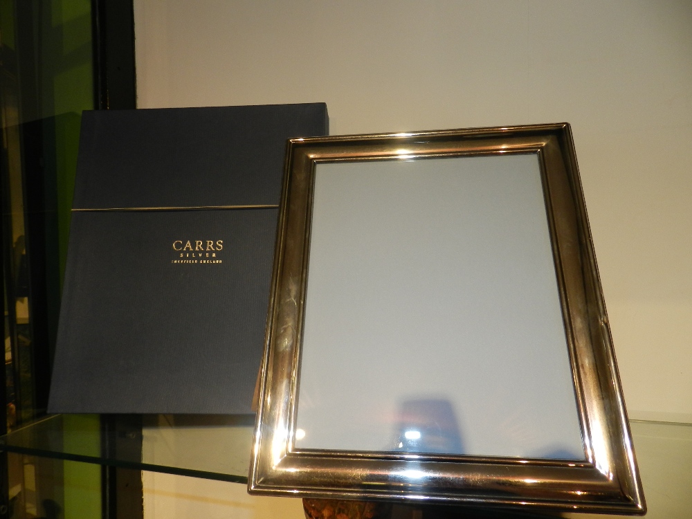 A sterling silver picture frame by Carrs of Sheffield.
