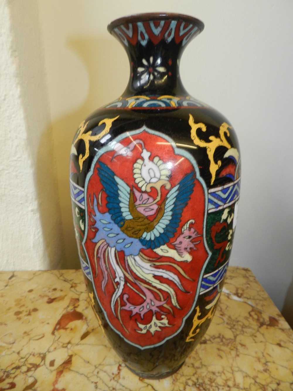 A Chinese cloisonne ovoid vase decorated with scrolls, geometric shapes and stylized flowers. A/F