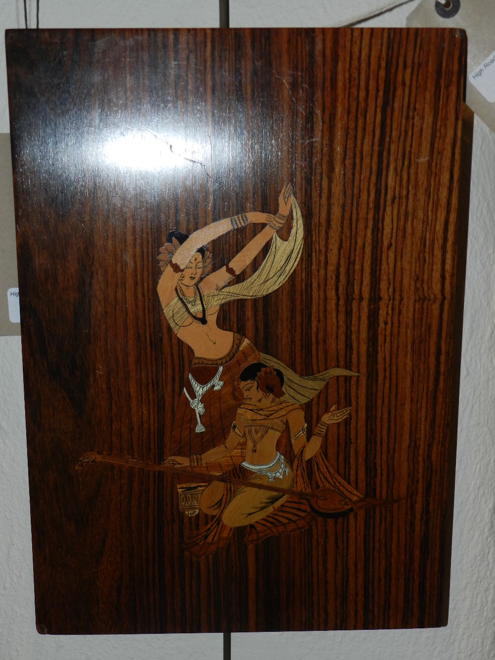 Eastern inlaid panel depicting dancing girls.