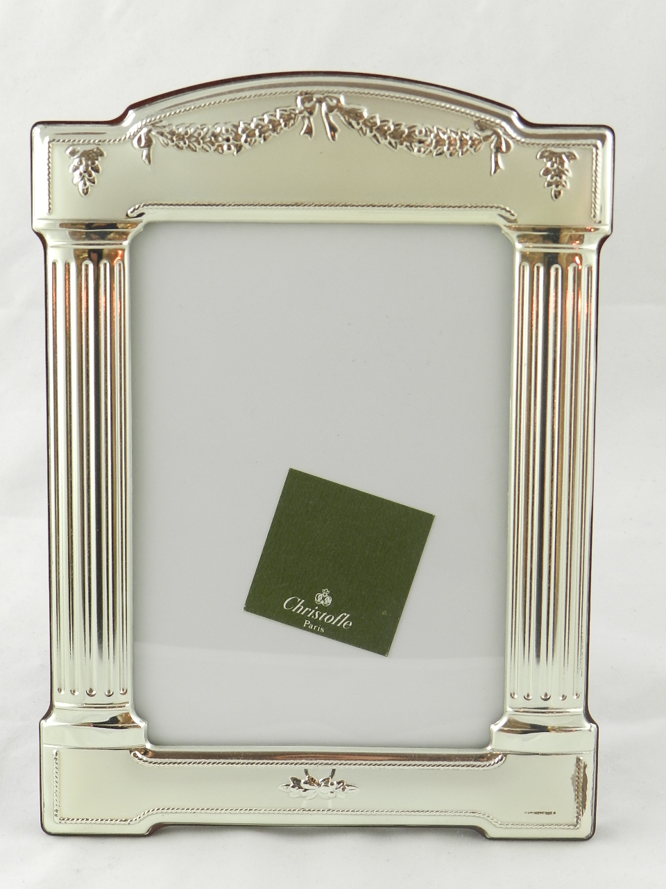 A contemporary silver plated photo frame by Christofle in a felt case