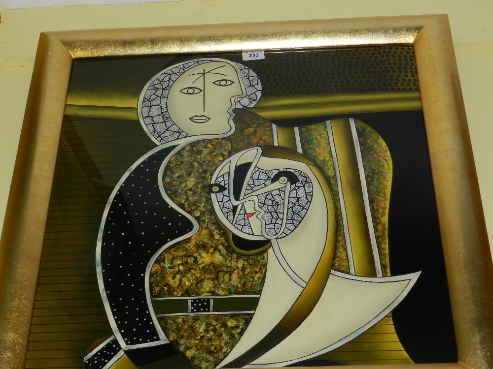 A framed reverse glass and enamel abstract figure in the style of Picasso.