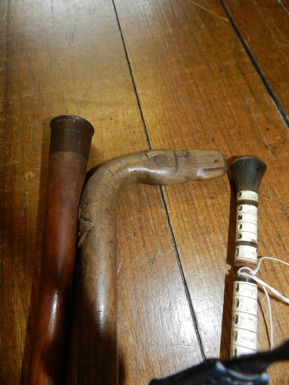 A bone and horn mounted gentleman`s walking cane.
