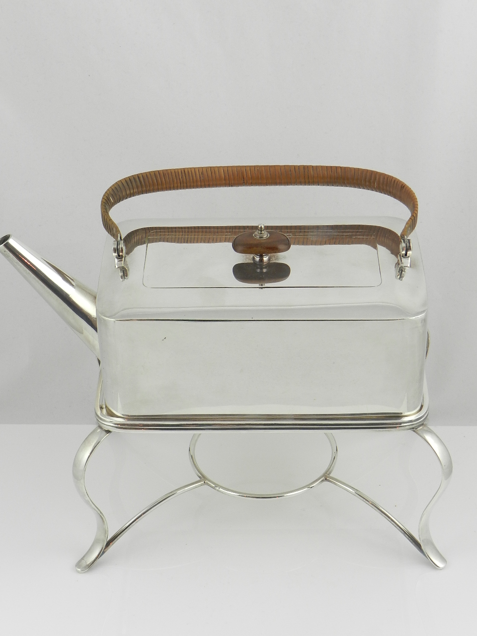 A 1920s Mappin & Webb silver plated spirit kettle on original stand, styled by Christopher