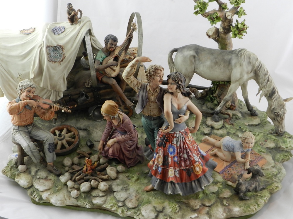 A large and impressive capo-di-monte porcelain group entitled "The Gypsy Encampment," sculpted by