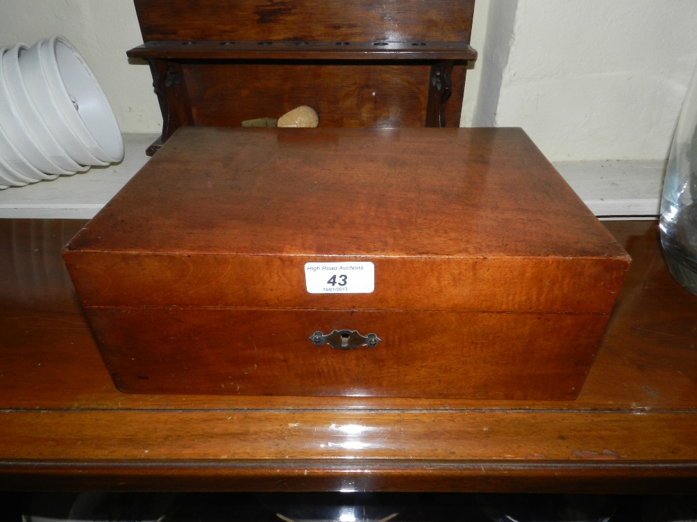 A Victorian oak stationary box the hinged cover revealing lined interior