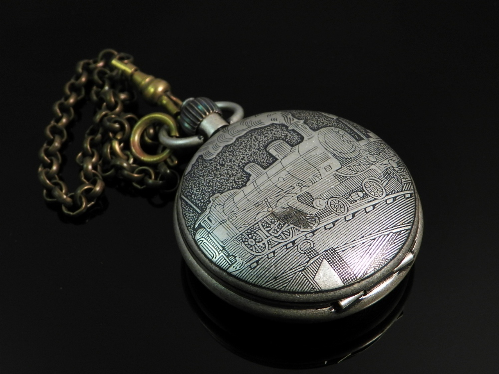 A white metal cased pocket watch of railway interest