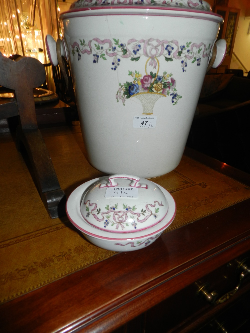 A four piece ceramic toilet set comprising washbowl, soap dish, jug and a slop pail decorated with