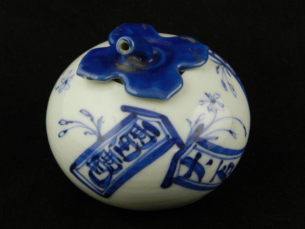 An oriental blue and white porcelain pot and cover