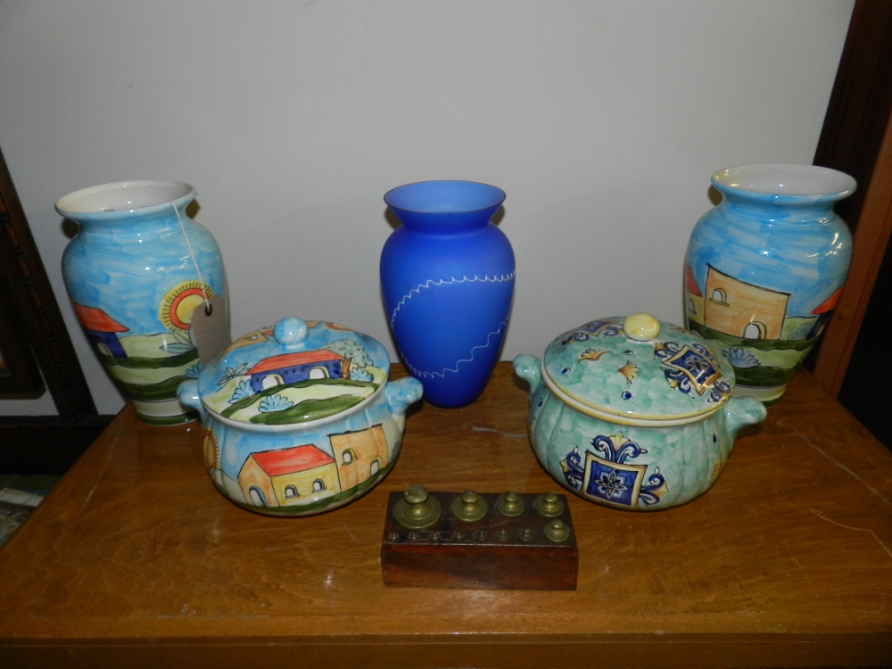 A collection of hand painted ceramics, vases, bowls, etc.