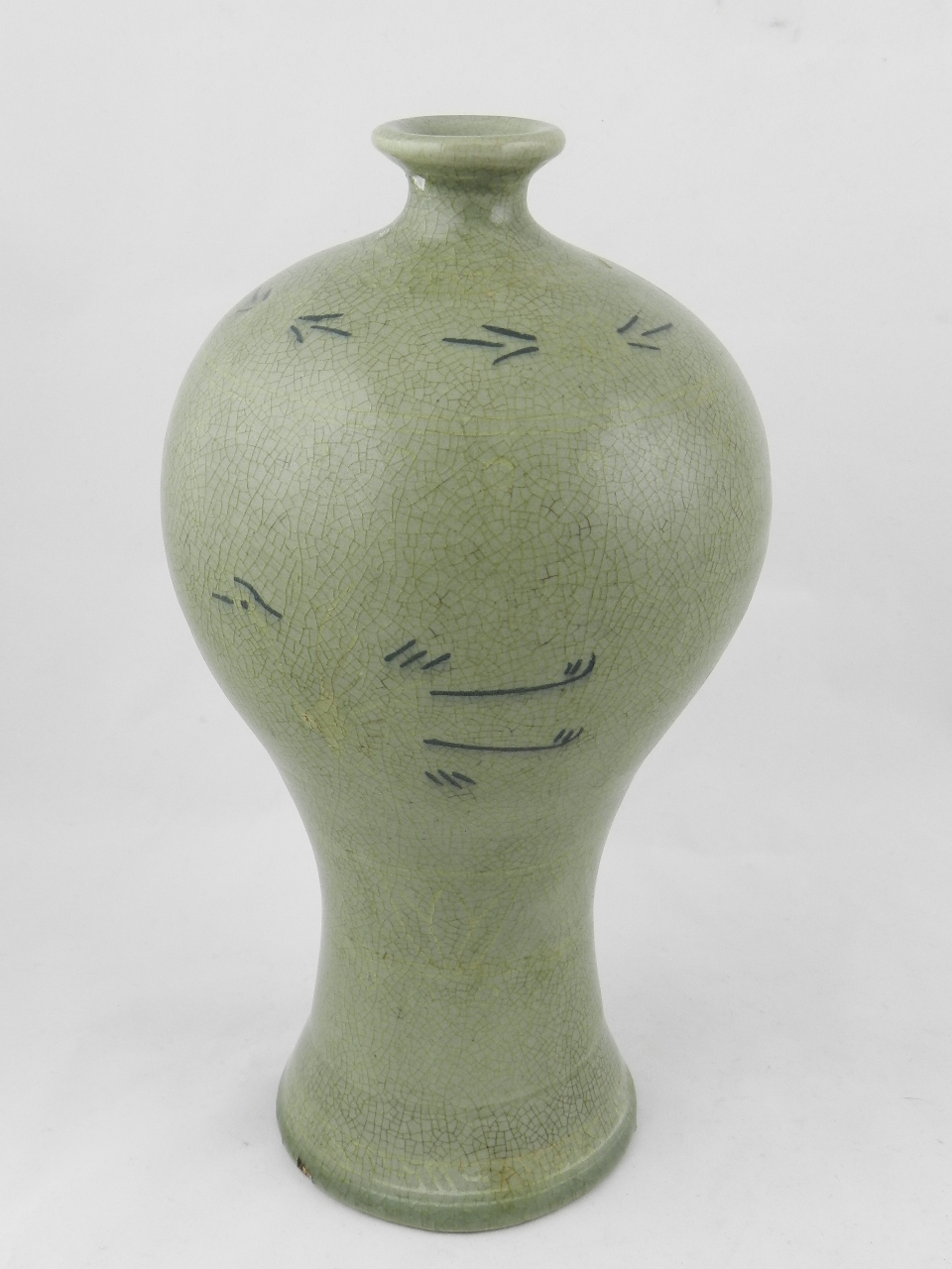 A Chinese crackle glazed porcelain vase of inverted baluster form decorated with stylized cranes.