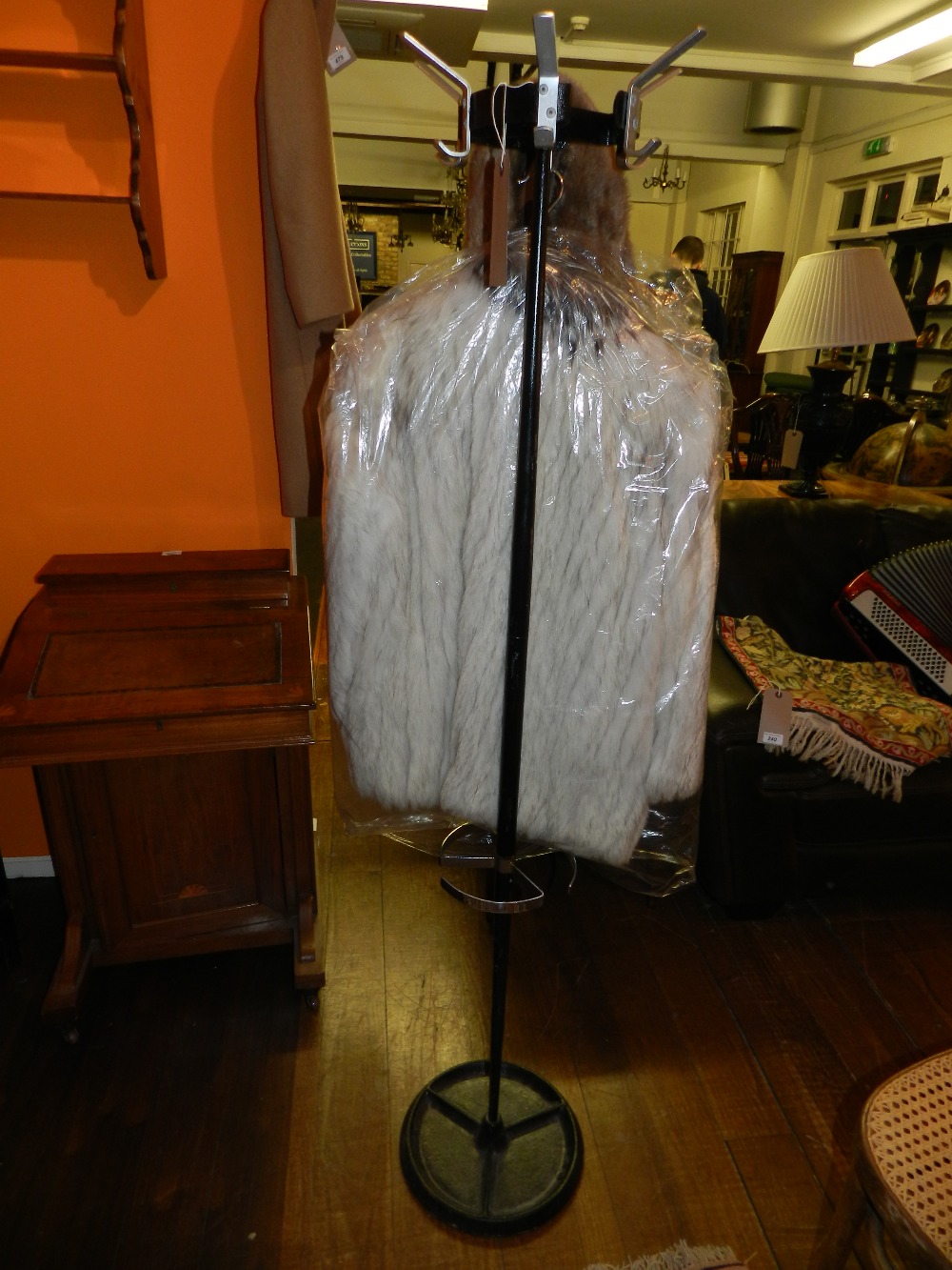 A vintage coat and stick stand