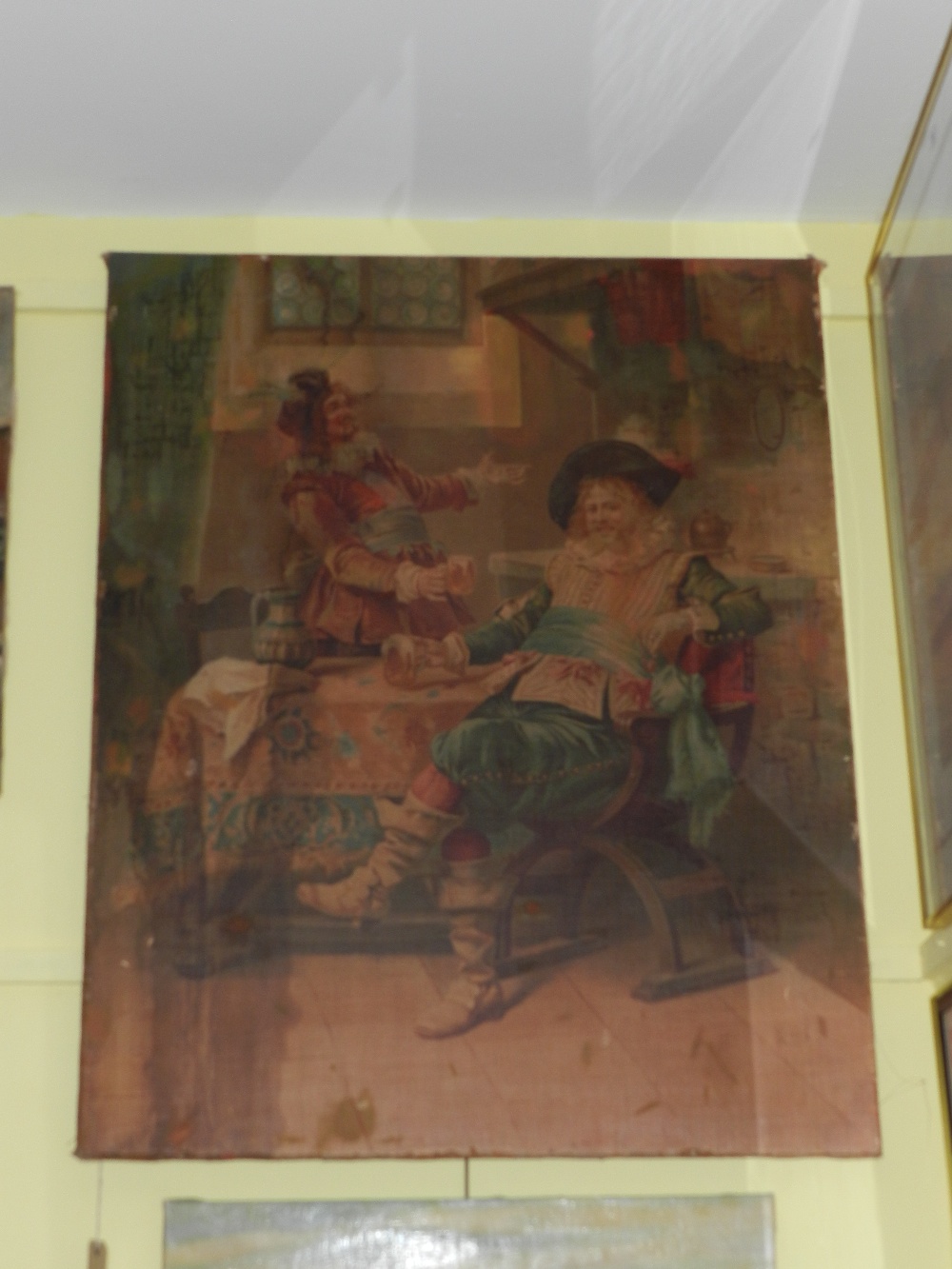 A large unframed 19th century lithograph laid on canvas of a interior  tavern scene