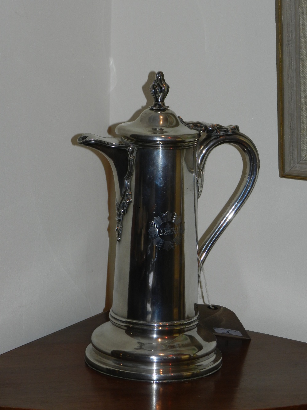 A 19th century Old Sheffield Plate ecclesiastical wine flagon with scroll handle, scroll mounted