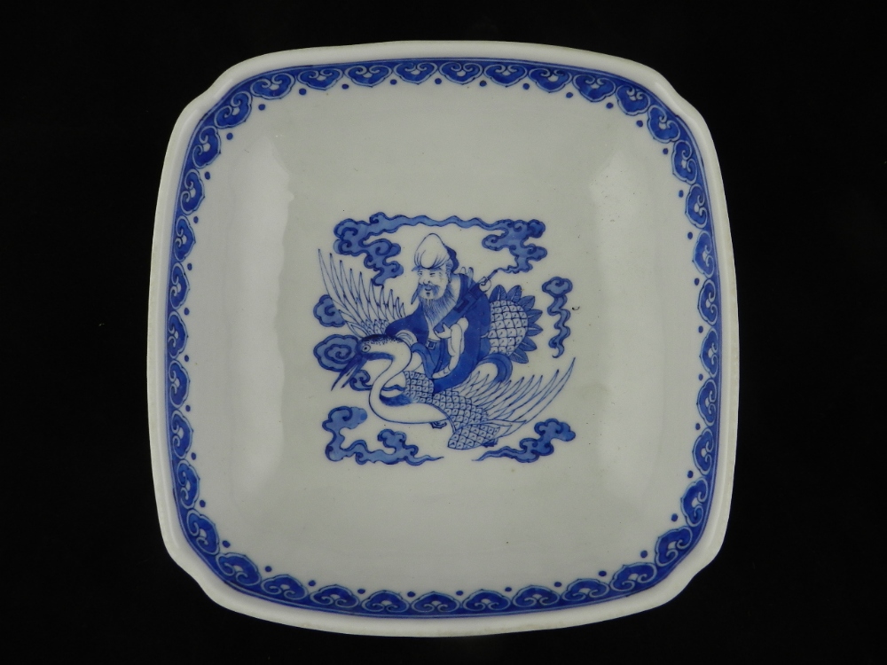 A Chinese blue and white porcelain square section bowl all over decorated with figures