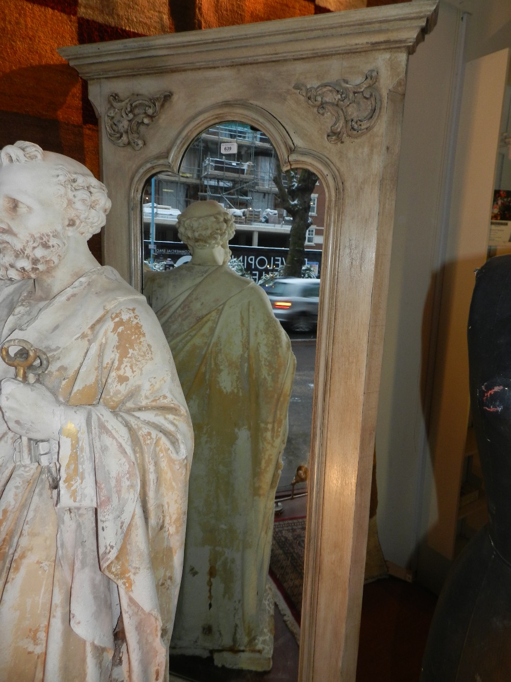 A large French style pier mirror having a painted frame. 187cm tall.