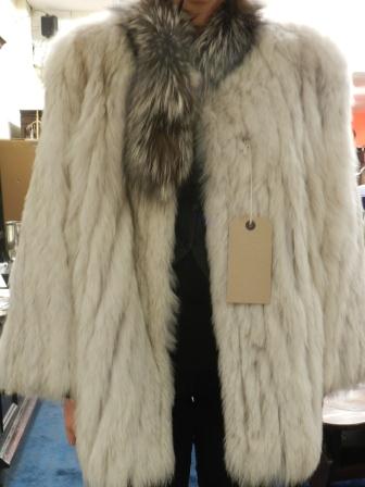 A retro 1970s smoky white fox fur jacket.