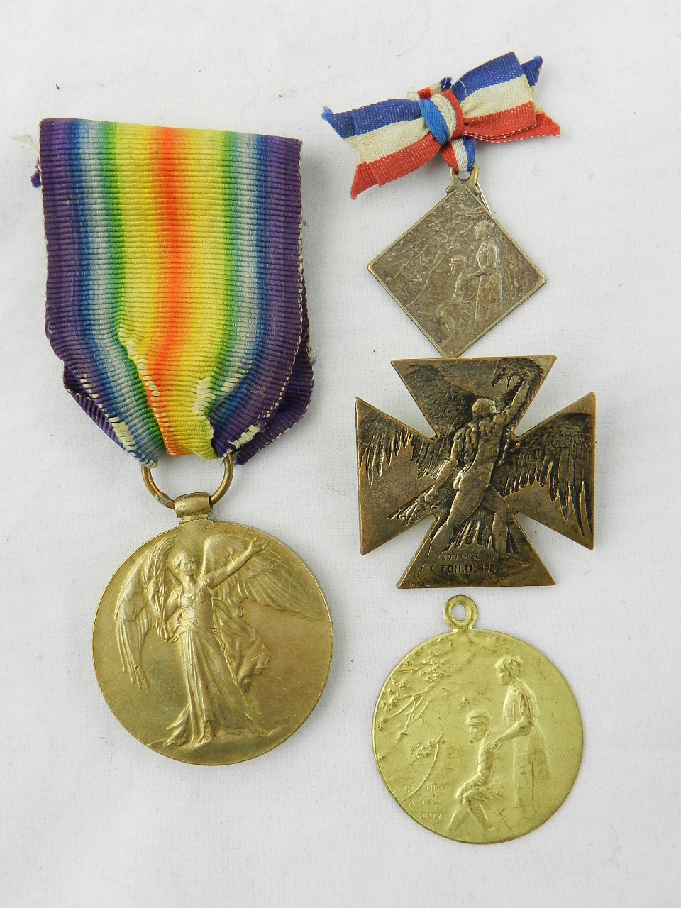 A trio of early 20th French century medals of military interest made by Lalique and stamped