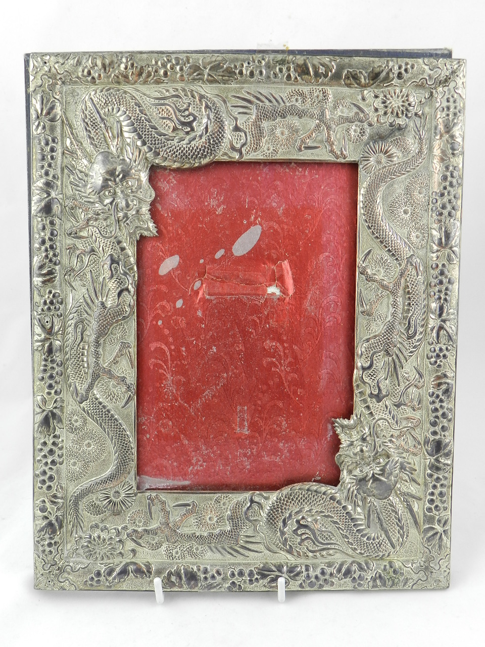 A 19th Century Oriental white metal frame.