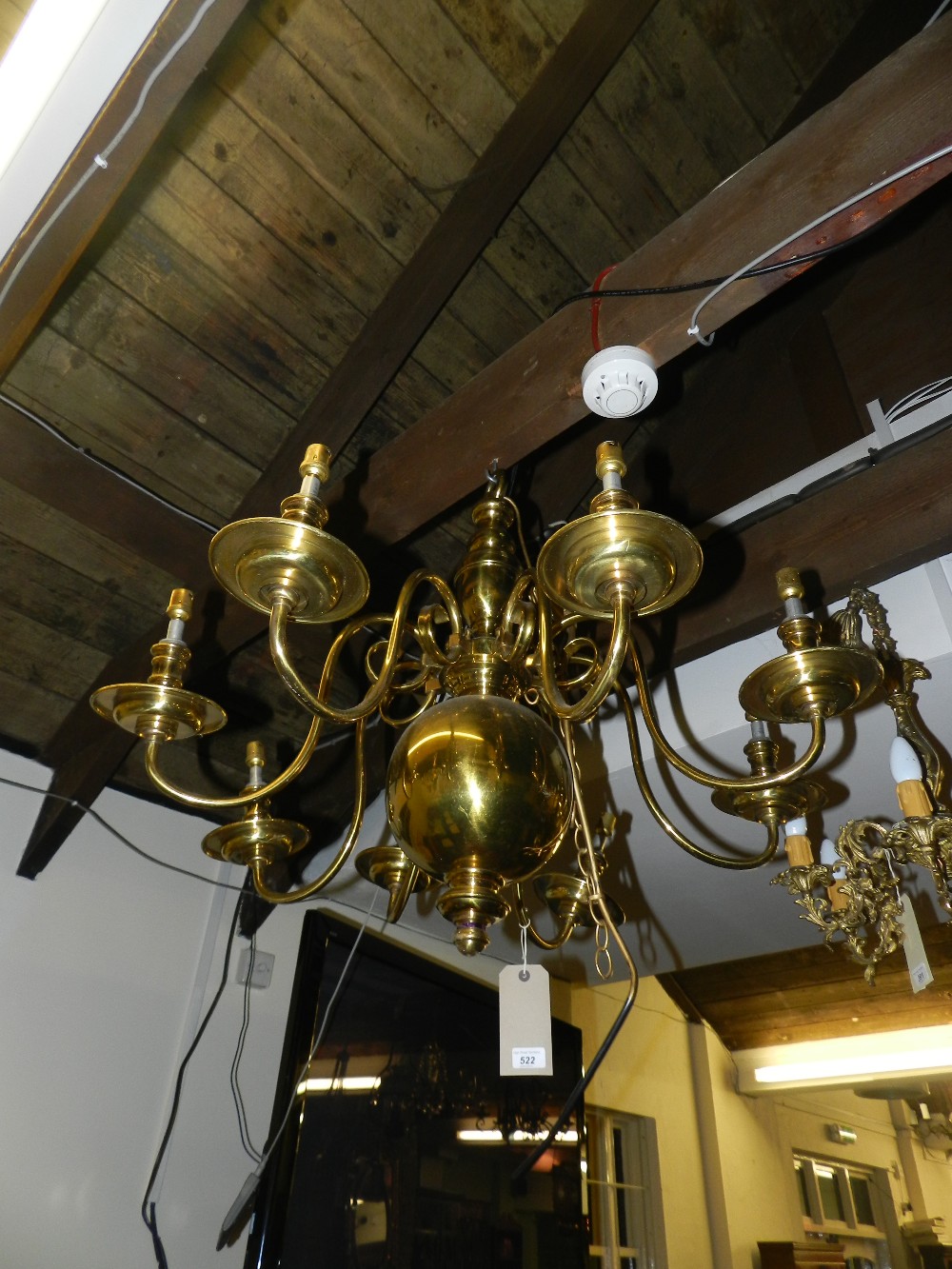 A pair of Dutch style gilt metal eight branch electrolie