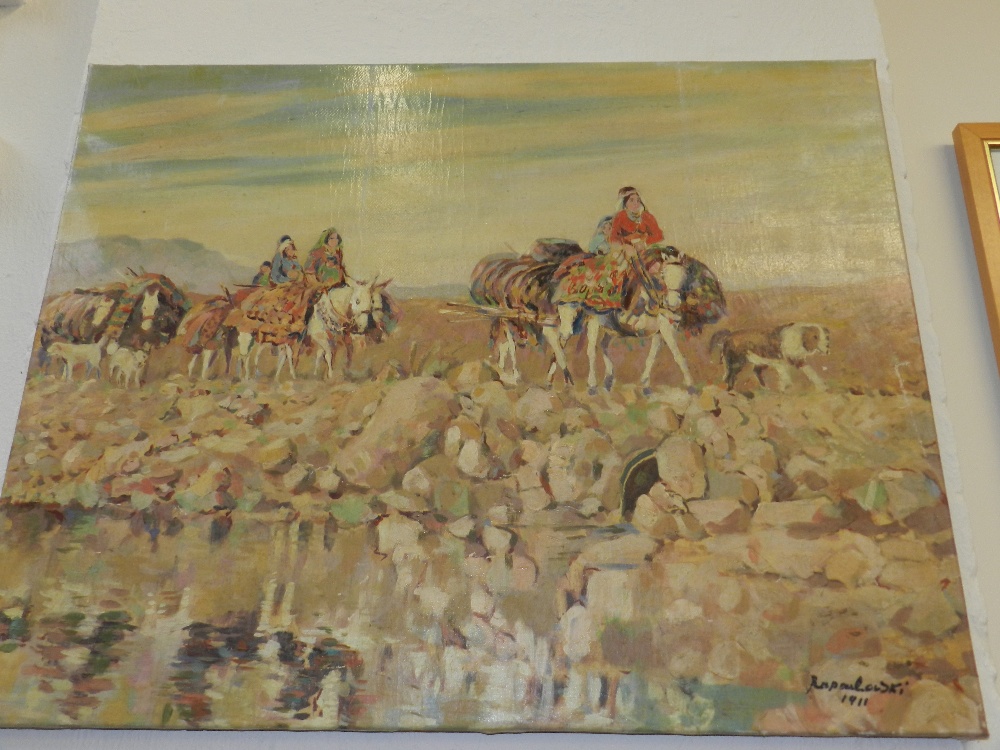 An unframed Russian oil on canvas,` Travelling Nomads` signed lower right.