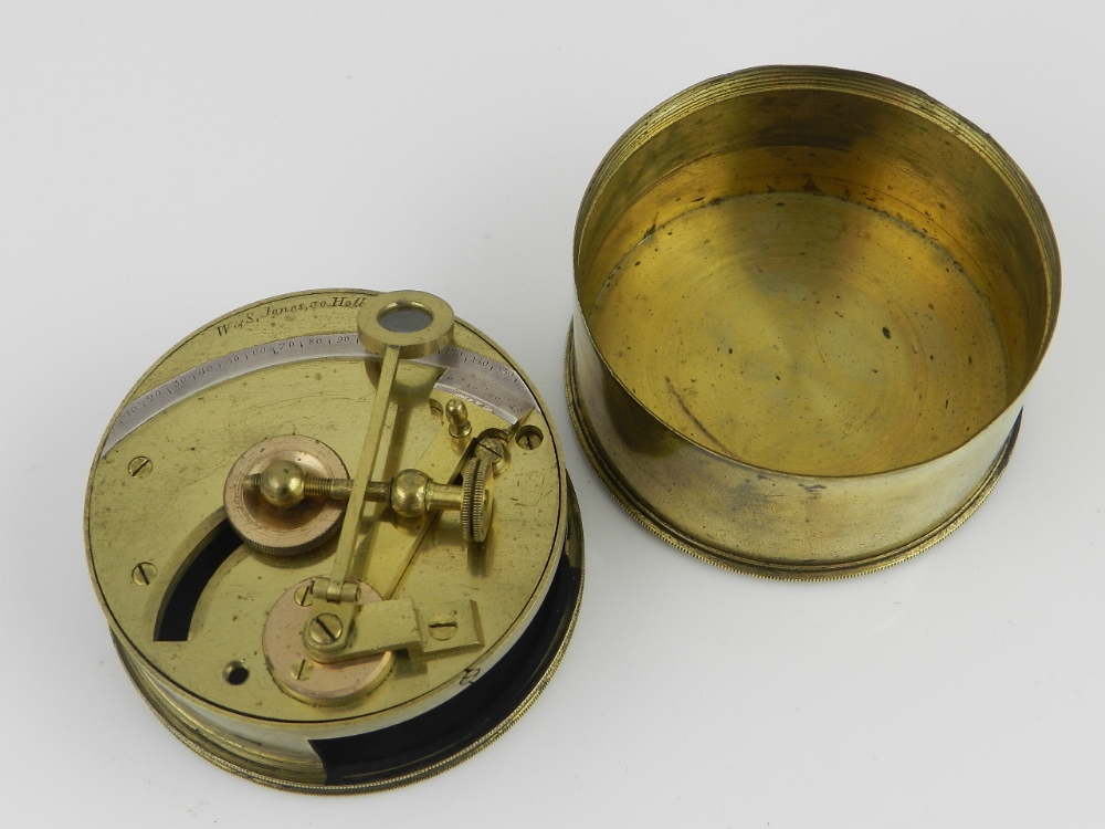 A portable brass sextant signed W&S Jones of Holborn with strew off cover.