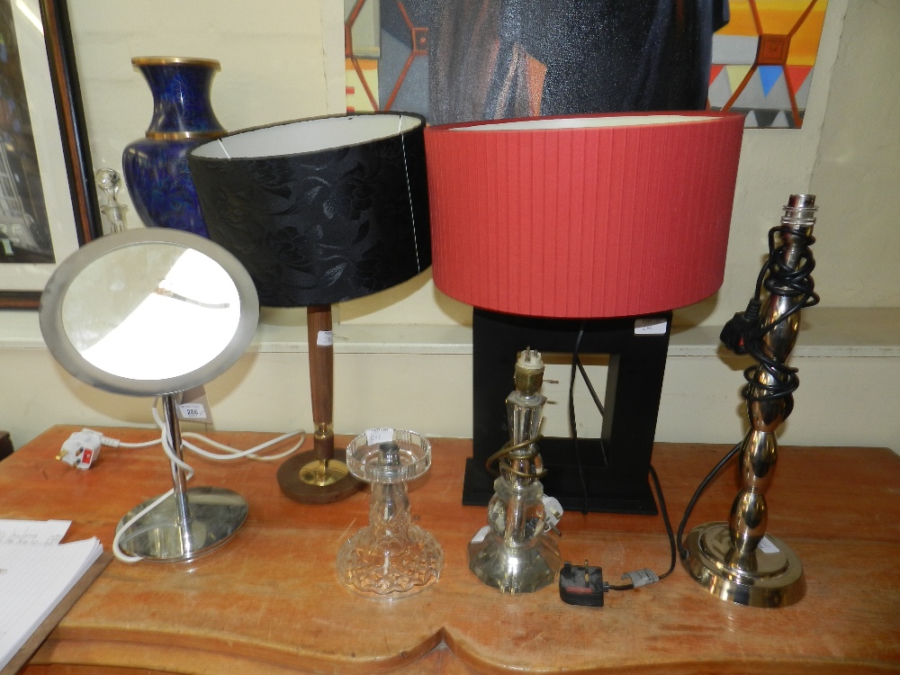 Six various lamp bases to include a back lit pedestal and two cut glass examples etc