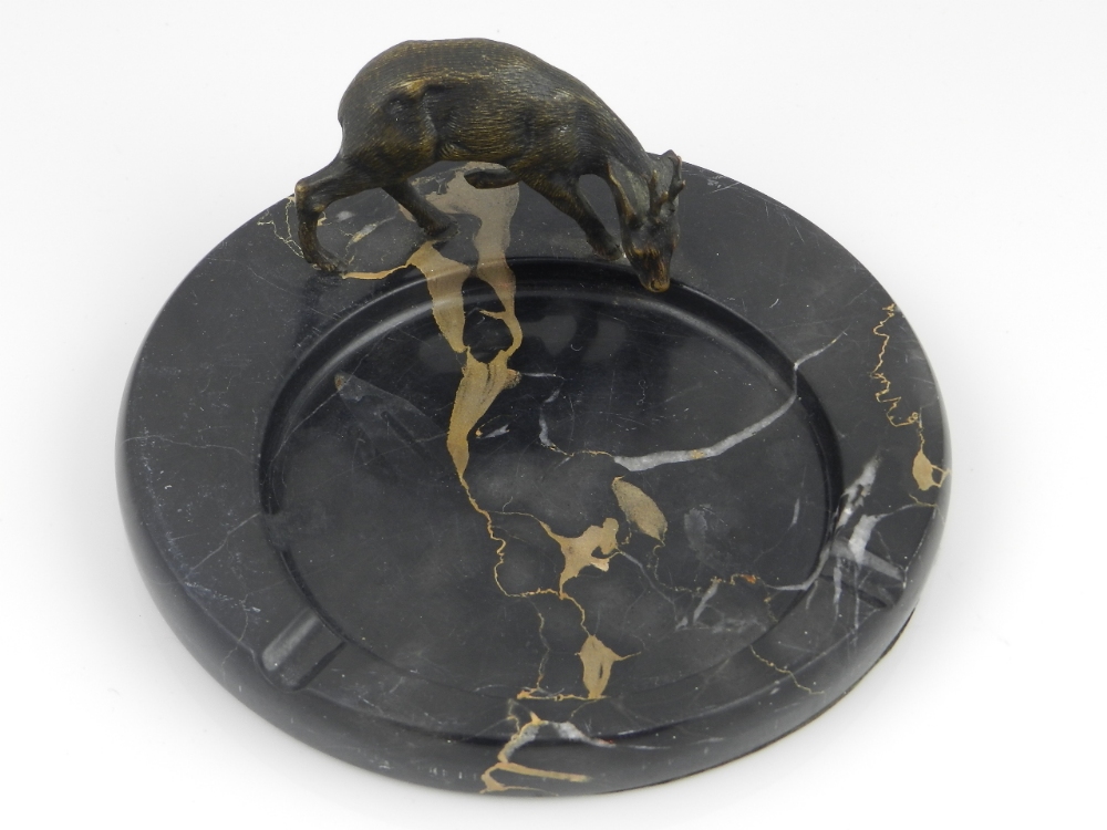 An art deco marble ash tray mounted with a bronze stag.