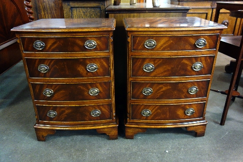 A pair of mahogany bow-front chests of drawers