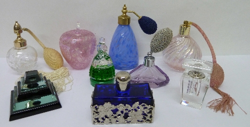 Eight glass scent bottles and a glass paperweight