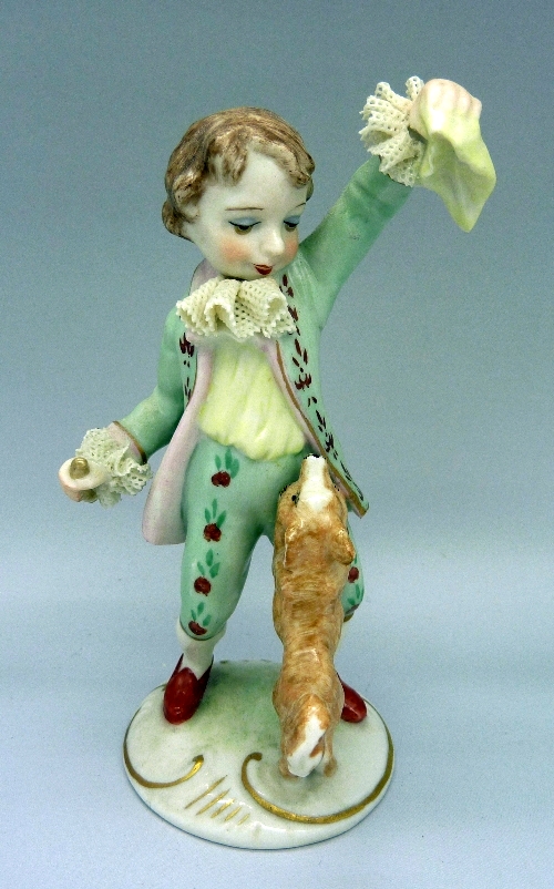 An Irish Dresden Emerald Collection figure, Kieran, height 11cms