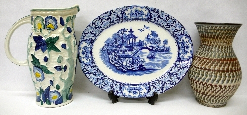 An H. Wood Persian Blue jug, a German vase and a blue and white plate