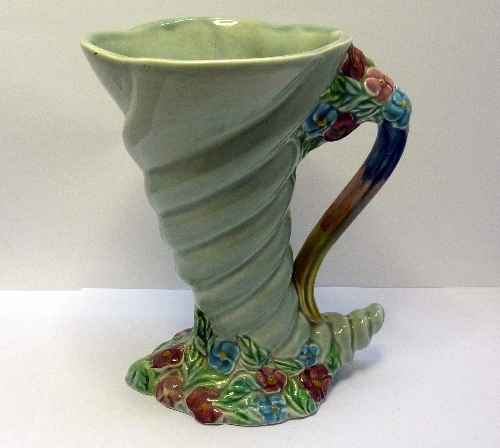 A Newport pottery Clarice Cliff relief moulded spiral cornucopia vase, shape number 809, height