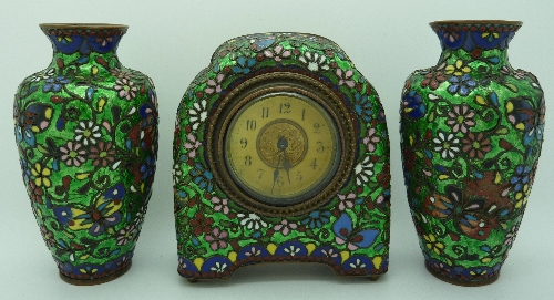 A cloisonne clock and vase garniture, height of clock 12cms, a/f