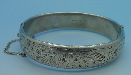 A silver bangle, weight 28.8gms