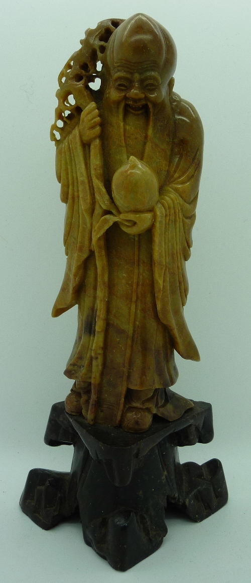 A Chinese soapstone carving of a sage, height 20cms