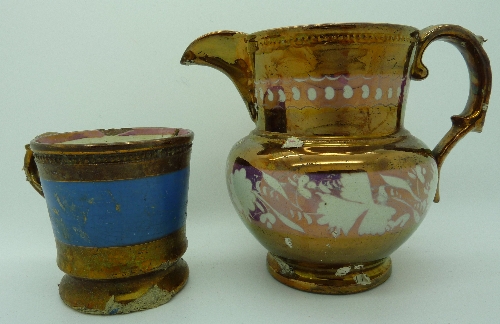 A 19th Century copper lustre jug and mug, height of jug 10.5cms, both a/f