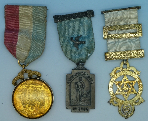 Two silver Masonic medals and a gilt metal Masonic medal