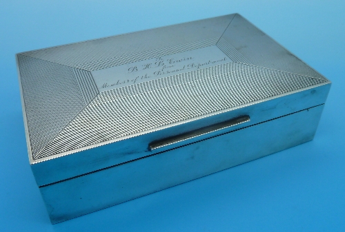 A silver cigarette box with presentation inscription, London 1964