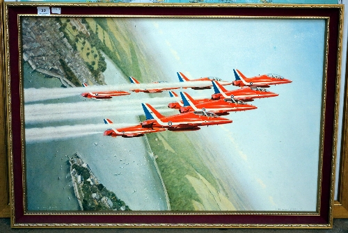 A red arrows print, framed