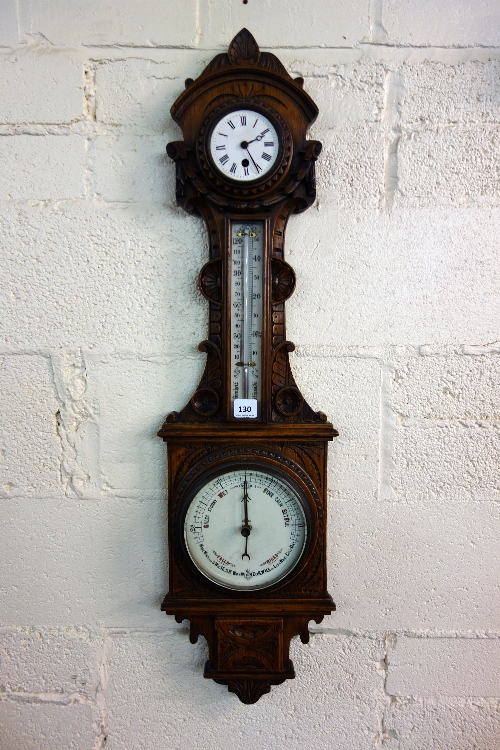 A Victorian oak barometer